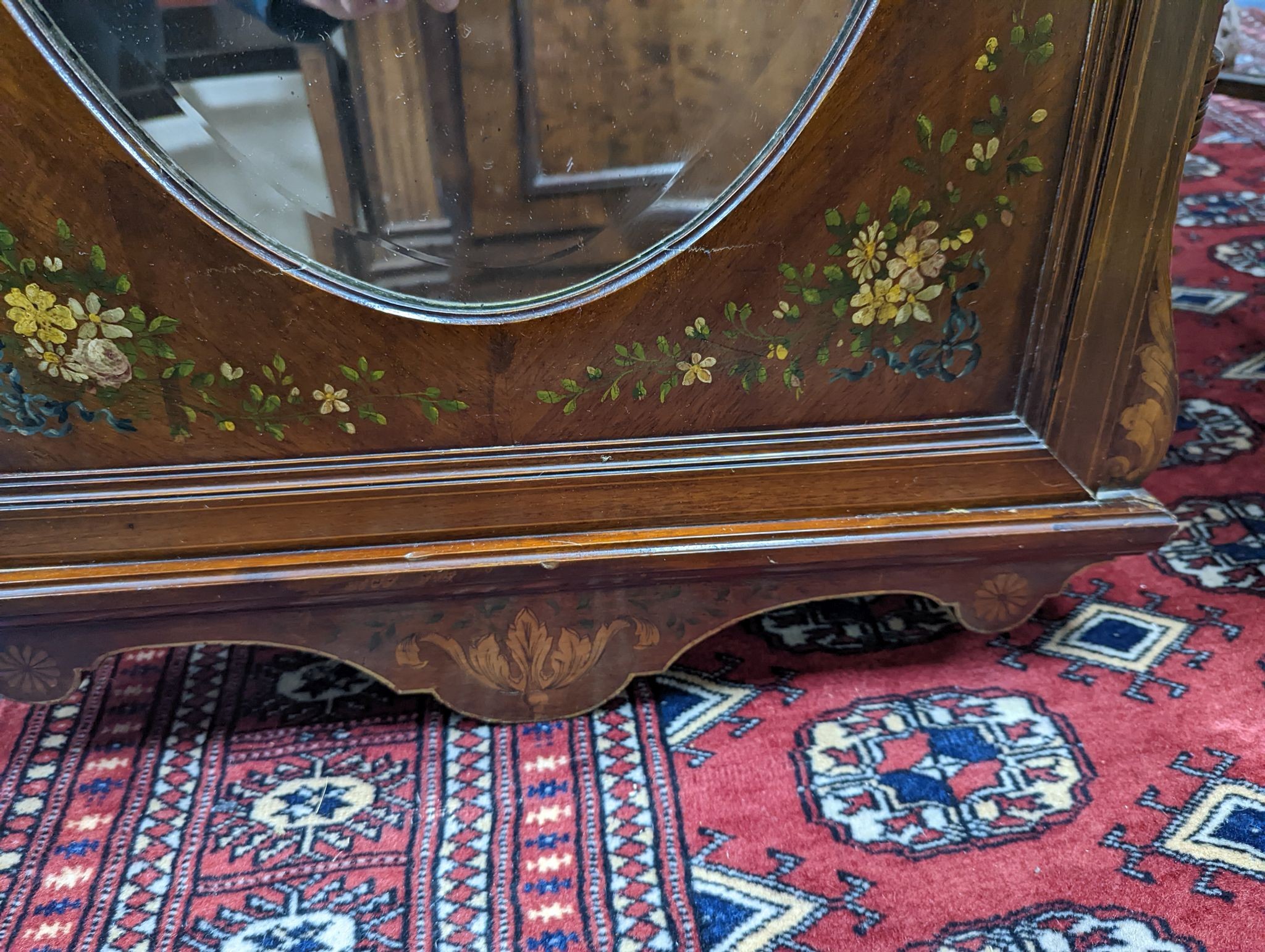 An Edwardian floral painted rectangular inlaid walnut wall mirror, with oval plate, width 50cm, height 91cm